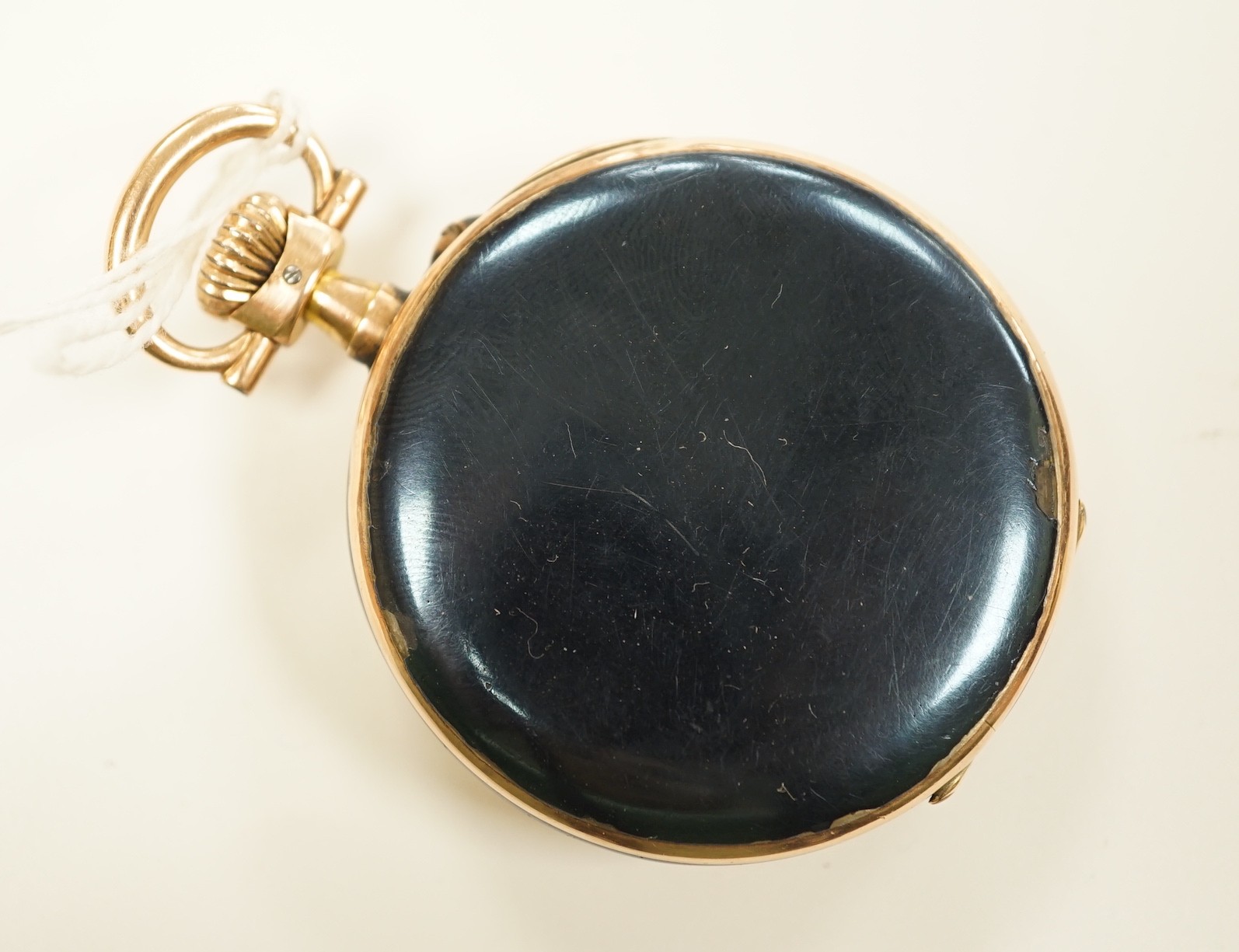 A late 19th century Swiss 935 white metal, gold plated and black enamel keyless lever open face pocket watch, in fitted case.